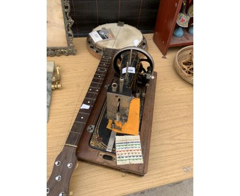 A BANJO AND A VINTAGE VESTA SEWING MACHINE 