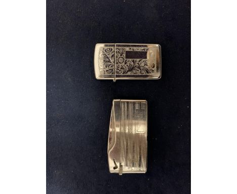 A VINTAGE ZIPPO AND FLICKER LIGHTERS 