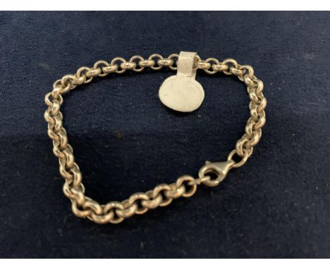 A SILVER ROLLER BALL BRACELET 