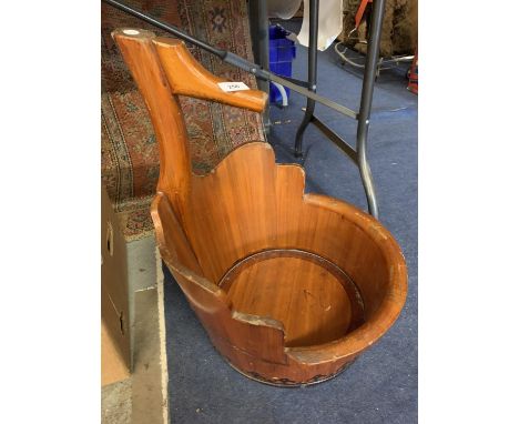 A LARGE UNUSUAL WOODEN PLANTER 