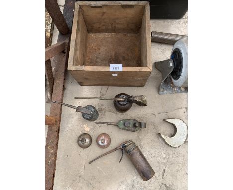 SIX VINTAGE OIL CANS AND A WOODEN BOX 