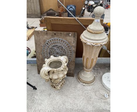 A LARGE URN, URN PLANTER (A/F) AND A MOUNTED CAST IRON CIRCLE 