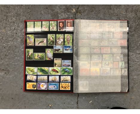 THE RED COMPASS STOCKBOOK HOUSING A FINE UNMOUNTED MINT COLLECTION OF FIJI 