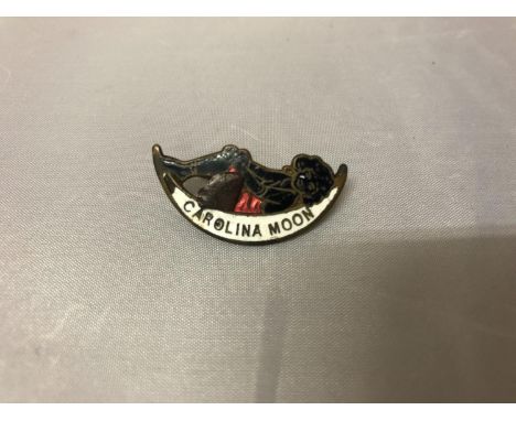 A CAROLINA MOON ENAMEL BROOCH 