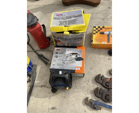 AN EARLEX WALLPAPER STRIPPER, CHALLENGE ORBITAL SANDER AND AN EXTENSION CABLE, IN WORKING ORDER 