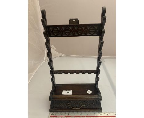 A SMALL MAHOGANY WALL SHELF WITH LOWER  DRAWER 