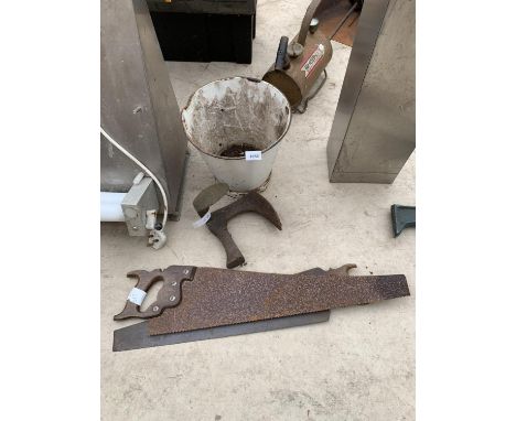 AN ENAMEL BUCKET, SHOE LAST AND TWO SAWS 