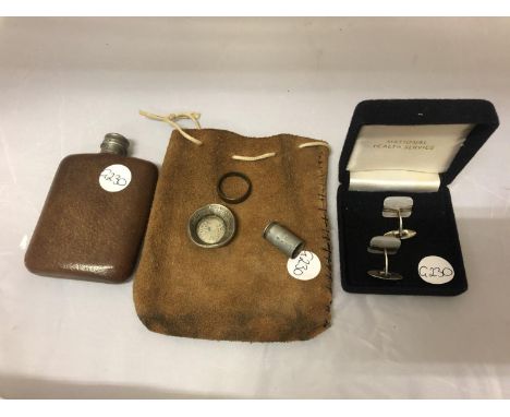 A HIP FLASK AND POUCH, 800 SILVER CUFFLINKS. .43 BULLET CASE, ONE PENNY RING AND 1920 HALF CROWN SHAPED INTO A TRAY 