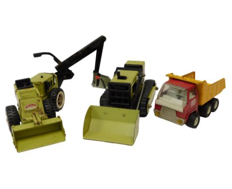A 1970's Tonka lime green pressed steel excavator,  the main body 10cm high, a Tonka lime green pressed steel Excavator, 11cm