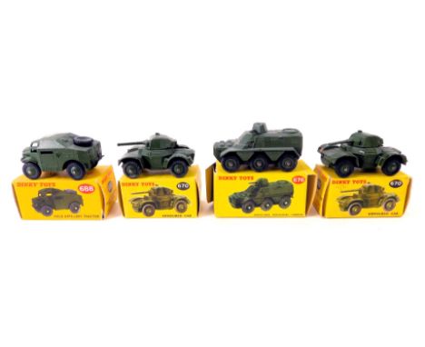 Four Dinky Toys vehicles, comprising armoured car 670 (2), armoured personnel carrier 676, and field artillery tractor 688. 