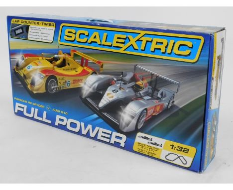 A Scalextric Full Power set, Porsche S Spider vs Audi R10, with lap counter and timer, boxed. 