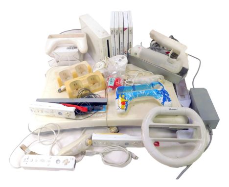 A Nintendo Wii console, model number RVL-001, together with accessories, controllers, games to include Wii Fit+ Sports Resort