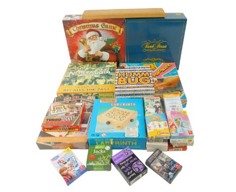 Various games, to include Traditional Santa Claus game, Trivial Pursuit, Hummbug playing cards, wooden labyrinth, Frustration