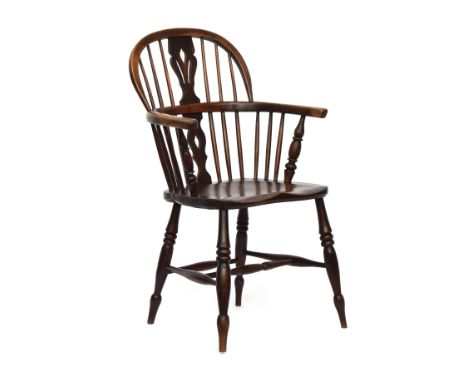 A 19th century ash and elm low splatback Windsor armchair, pierced two piece splat, over a saddled seat, stamped 'JG' to unde