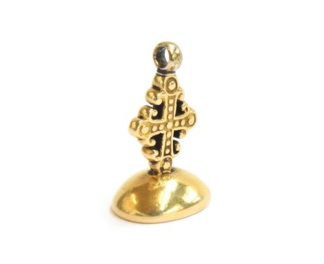 A Victorian 18ct gold fob seal in the form of a granulated cross, the carved agate intaglio bearing the Barnett family crest,