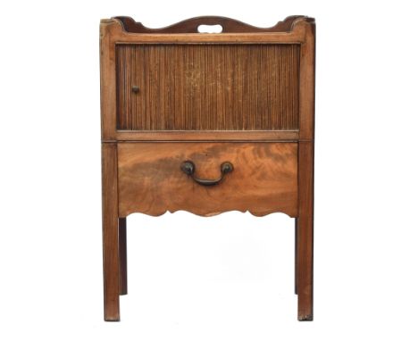 A George III tray top commode, the three quarter gallery with pierced handles, over a tambour front and a single drawer with 