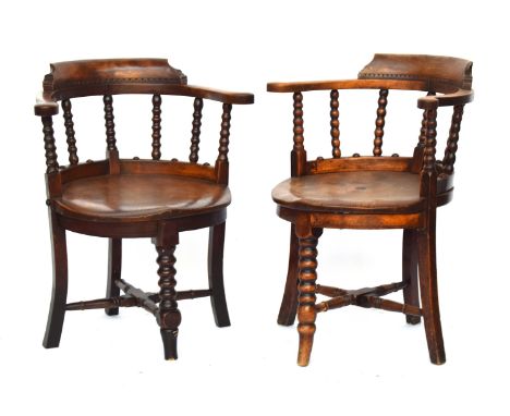 A harlequin set of six Victorian bobbin turned smoker's bow armchairs, ash and elm, each with bobbin turned spindles, circula