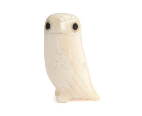 Donald Ungott (1935-2002) an owl figurine caved from walrus tusk with double inlaid eyes, 5.5cm highUngott was a Siberian Yup