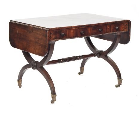 A Regency mahogany sofa table, c.1820, two piece top above two drawers with fleur-de-lis inlay and bead moulding below, each 