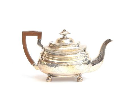 A George III silver teapot by William Welch II, Exeter 1814, of banded rectangular form with harp handle, bright cut decorati