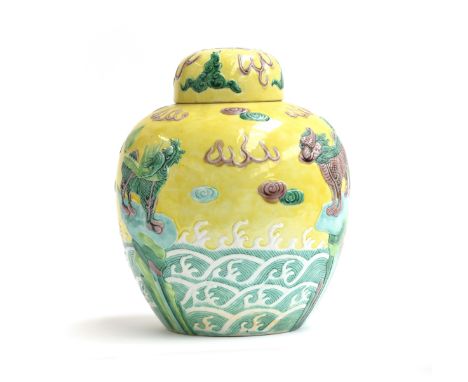 Chinese Wang Bing Rong relief decorated baluster shaped ginger jar and  cover, the turquoise blue gre