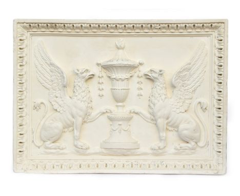 A large plaster panel by PJ Hone, London 2011, depicting two griffins either side of an urn with bell flower swag, 126cm wide