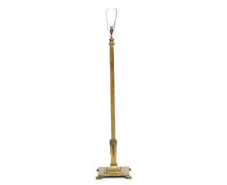 An early 20th century heavy brass standard lamp, adjustable height, on a square stepped weighted base, approx. 130-190cm high