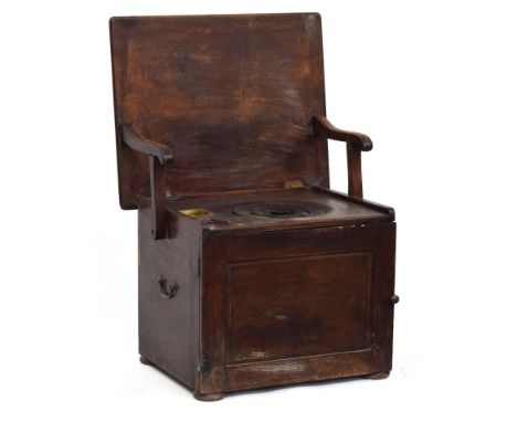 A 19th century commode chair, folding top opening to a turned lid and liner, with brass loop carry handles, 69cm wide 
