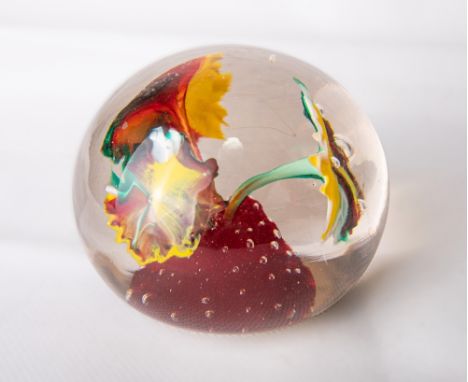 A rare and unusual Whitefriars glass trail lampwork floral paperweight, featuring three polychrome flower heads set within a 