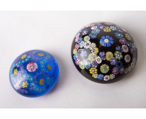 Two rare and unusual Whitefriars glass paperweight 'buttons' the larger of garland arrangement with cobalt ground, the smalle
