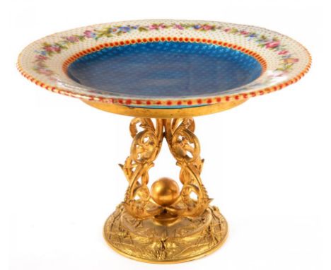 A FRENCH ORMOLU MOUNTED ENAMEL TAZZA, THE TRANSLUCENT BLUE GROUND ENCIRCLED BY A BORDER OF TRAILING FLOWERS, 14.5CM H, LATE 1