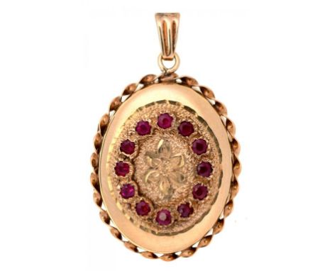 A RUBY SET LOCKET IN 9CT GOLD, 26 X 24MM, 5.3G++GOOD CONDITION