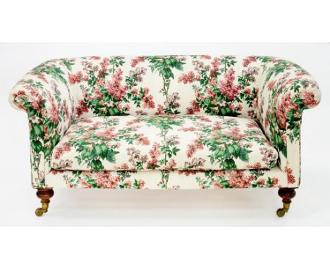 A VICTORIAN MAHOGANY CHESTERFIELD SOFA ON BRASS CASTORS, 165CM W
