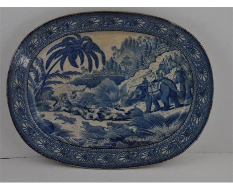 A rare 19th century blue and white Indian tiger hunting series meat plate with a tiger, dogs and elephants. 39cms. There is a