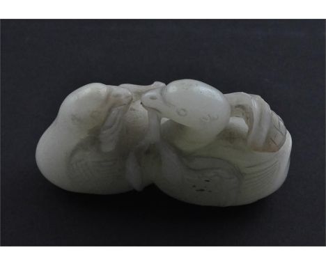 A Chinese jade group of two geese with fruiting stem in their beaks, probably 19th century, length 6.9 cm.
