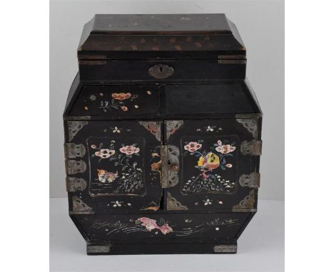 A Chinese black lacquered and mother of pearl inlaid table top cabinet,&nbsp;having painted mother of pearl decoration with b