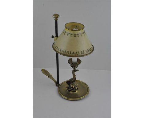 A 19th cent brass dolphin students lamp with adjustable toleware shade.