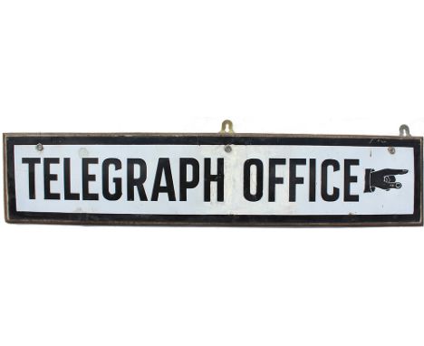 Enamel Telegraph Office Sign with right pointing hand. Measuring 30in x 6in. Some restoration.