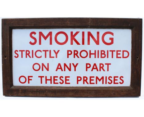 Enamel Smoking Strictly Prohibited On Any Part Of These Premises, in frame. Measuring 27in x 15in.