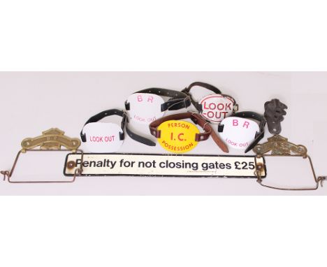 Quantity 5 enamel Armbands, all with straps, four of which are Look-Out, the other Person I.C. Posession. Together with a £25