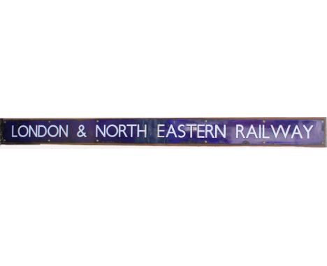 Enamel LONDON &amp; NORTH EASTERN RAILWAY, mounted on board. Measuring 80in x 6.75in.
