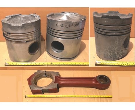 Diesel Engine Pistons qty 3 together with a singular conrod. Two pistons are approximately 9in diameter the other 6in diamete
