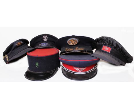 Railway Hats, quantity 6 comprising: Station Master with BR(Sc) L-O-W wreath gilt badge, size 7.3/8; BR with BR(E) enamel tot