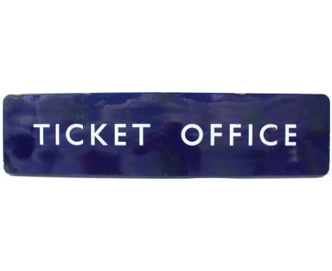 Enamel BR(E) flanged TICKET OFFICE. It has a few repairs. Measuring 48in x 12in.
