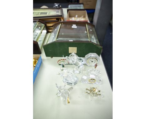 A WOOD AND GLAZED SMALL MURAL DISPLAY CABINET WITH MIRROR BACK, CONTAINING A COLLECTION OF APPROX 11 LARGE FACETED GLASS ORNA