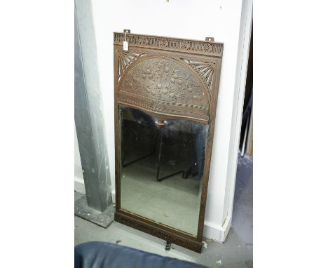 AN EDWARDIAN CAST IRON VERTICAL MIRROR 