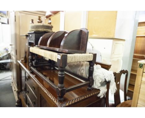 AN OAK FRAMED LONG LOW FOOTSTOOL, A LADY'S OAK WORKBOX IN THE FORM OF A JOINED STOOL, A SMALL COOPERED BARREL, A SMALL CORNER