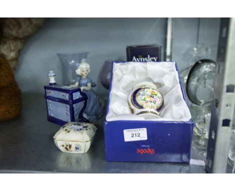 A MUSICAL ORNAMENT OF A CHILD SEATED AT A PIANO, ON SPINNING BASE, A VASE WITH FRUIT DECORATION, A BRANDY GLASS AND WARMER, T