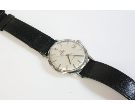 A gentleman's stainless steel Omega Seamaster Automatic watch, with a silvered dial, raised batons, date, and sweep seconds h