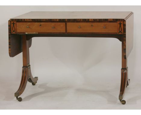 An early 19th century satin birch and coromandel crossbanded sofa table, 99cm wide